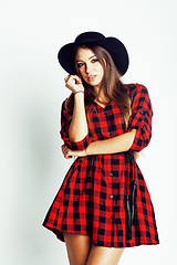 Image showing young pretty brunette girl hipster in hat on white background casual close up dreaming smiling. real american modern woman, lifestyle real people concept