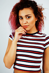 Image showing young happy smiling latin american teenage girl emotional posing on white background, lifestyle people concept 