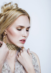 Image showing young pretty blond woman in luxury jewelry, lifestyle rich people concept 