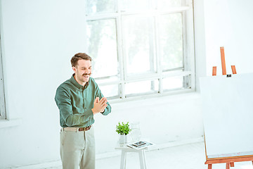 Image showing Speaker at Business Meeting in the conference hall.