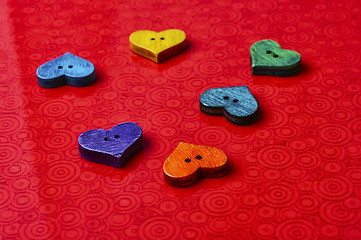 Image showing Symbolic hearts on red background