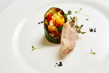 Image showing Steamed chicken fillet and vegetables. Shallow dof.