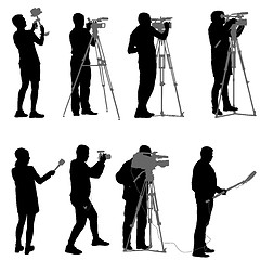 Image showing Set cameraman with video camera. Silhouettes on white background