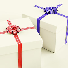 Image showing Gift Boxes With Blue And Red Ribbons As Presents For Him And Her