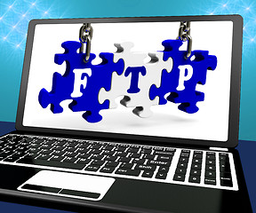 Image showing FTP Puzzle On Laptop Shows Files Transmission