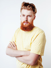 Image showing young handsome hipster ginger bearded guy looking brutal isolated on white background, lifestyle people concept 