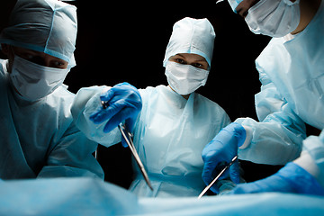 Image showing Photo of doctors with instruments