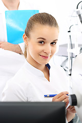 Image showing Young attractive doctor ophthalmologist at an ophthalmologist 