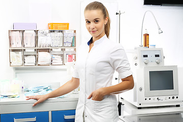 Image showing The anesthetist, preparing for surgery.