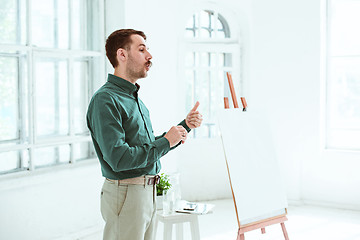 Image showing Speaker at Business Meeting in the conference hall.