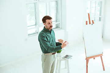 Image showing Speaker at Business Meeting in the conference hall.