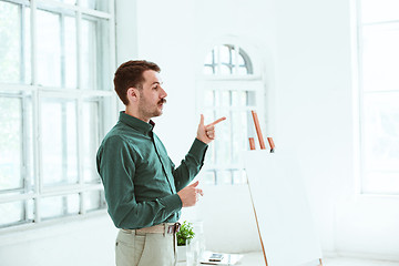 Image showing Speaker at Business Meeting in the conference hall.