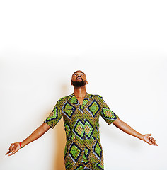 Image showing portrait of young handsome african man wearing bright green nati