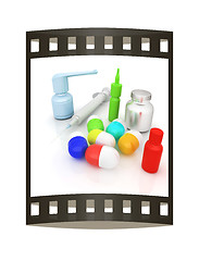 Image showing Syringe, tablet, pill jar. 3D illustration. The film strip