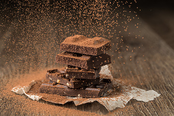 Image showing Chocolate sprinkled cocoa on paper