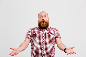 Image showing Man with beard waving hands