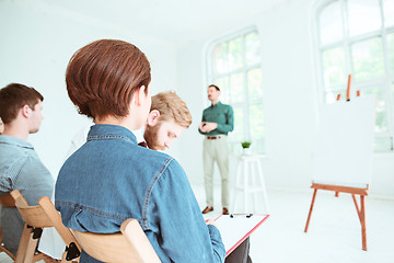 Image showing The people at Business Meeting in the conference hall.