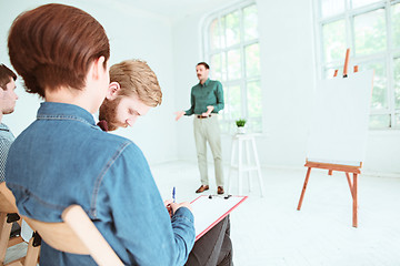 Image showing The people at Business Meeting in the conference hall.