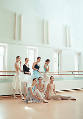 Image showing The seven ballerinas at ballet bar