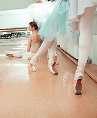 Image showing The seven ballerinas at ballet bar