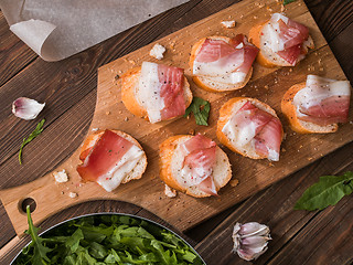 Image showing Table with bread and bacon