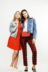 Image showing best friends teenage girls together having fun, posing emotional on white background, besties happy smiling, lifestyle people concept