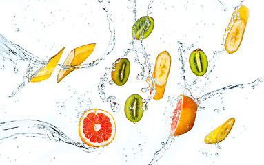 Image showing Abstract background with tropical fruits in water drops