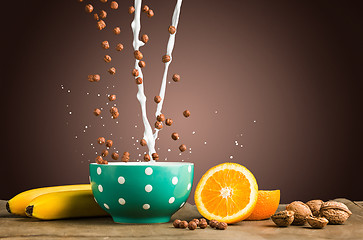 Image showing Healthy home made breakfast of Falling muesli and milk