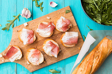 Image showing Bread and bacon on table