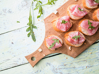 Image showing Sandwiches ,ham on wooden table