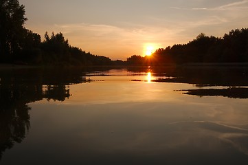 Image showing Sunset over a river