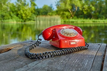 Image showing Old telephone in nature