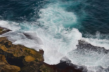 Image showing Waves hitting shore