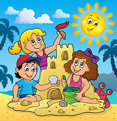 Image showing Children building sand castle theme 3