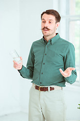 Image showing Speaker at Business Meeting in the conference hall.