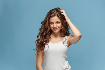 Image showing The young woman\'s portrait with happy emotions