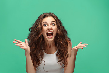 Image showing Portrait of young woman with shocked facial expression