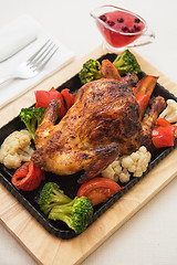 Image showing Roasted chicken with vegetables.