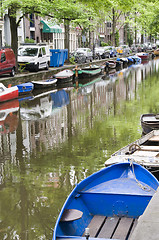 Image showing canal scene with boats houses amsterdam holland