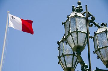 Image showing flag malta with historic street lamp valletta