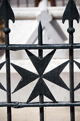 Image showing maltese cross wrought iron fence