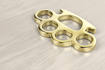 Image showing Golden brass knuckles