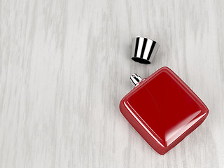 Image showing Red perfume bottle