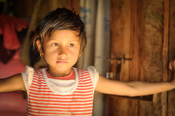 Image showing Small girl with earrings  in Nepal