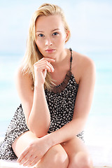 Image showing Holiday relaxation, woman resting on the beach. 