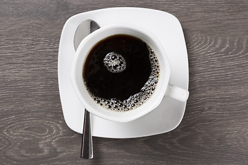 Image showing Cup of black coffee, top view
