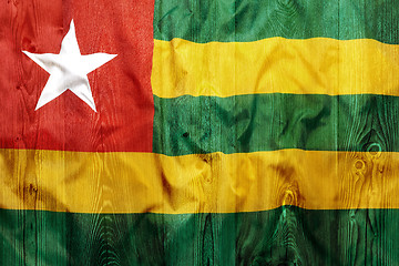 Image showing National flag of Togo, wooden background