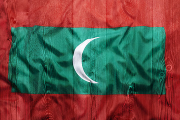 Image showing National flag of Maldives, wooden background