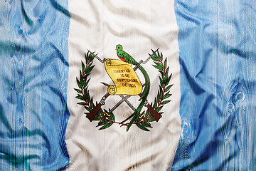 Image showing National flag of Guatemala, wooden background