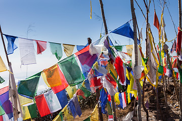 Image showing Buddhist prayer flags on a mountaintop in the Himalayas